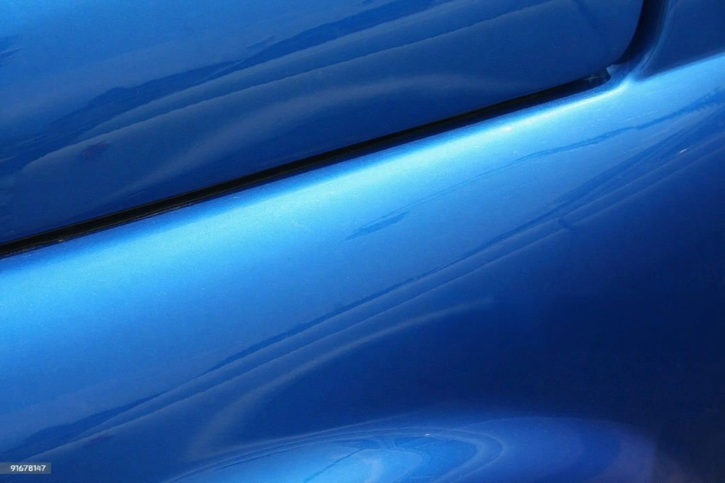 Vehicle dent after cosmetic repair